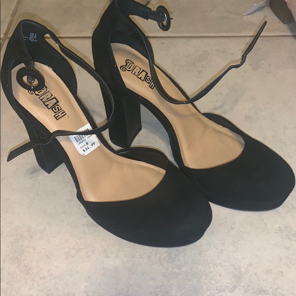 Black heels never worn